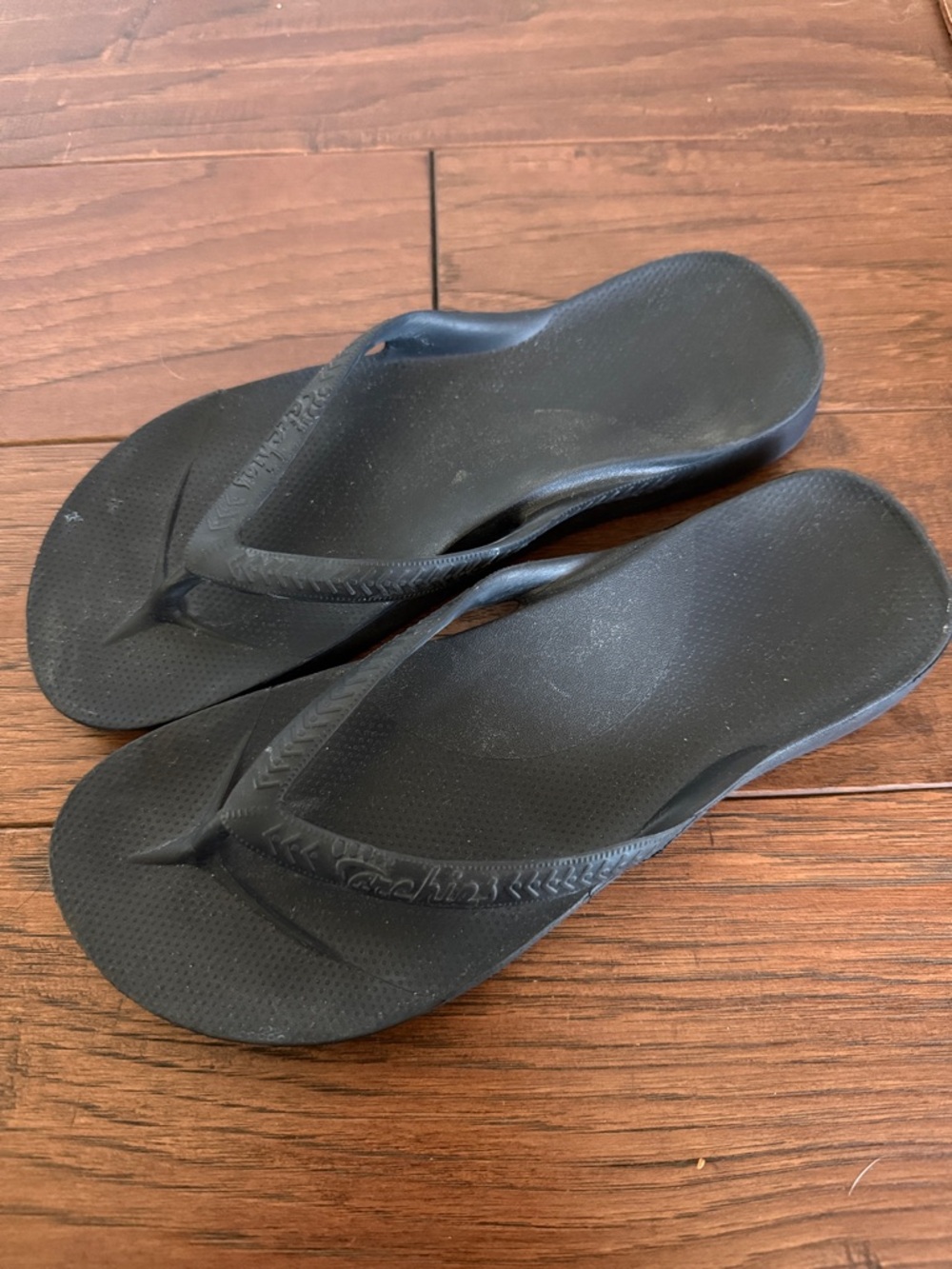 Archie’s Black Flip Flop Sandals